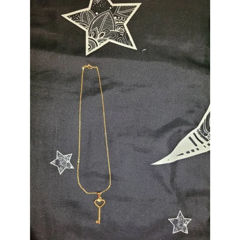 Butterfly and heart charm necklace